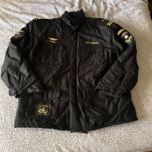 Men’s Black and gold military jacket with patches